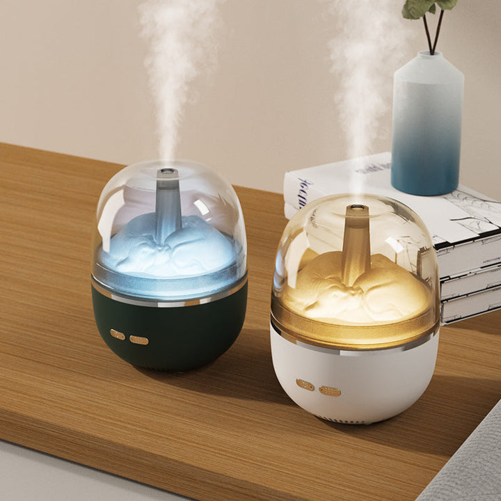 Liten aromdiffuser med färgskiftande ljus och tät kall dimma