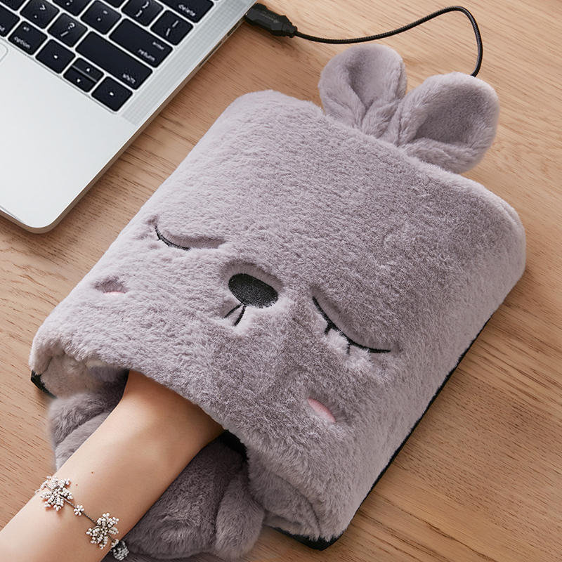 Uppvärmt musmatta med handvärmare i mjuk fleece