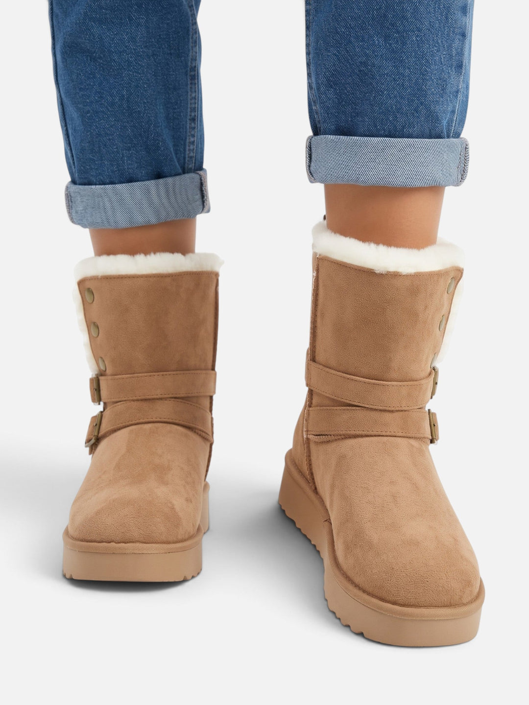 Boots i mockaimitation med fuskpäls och spännen för dam