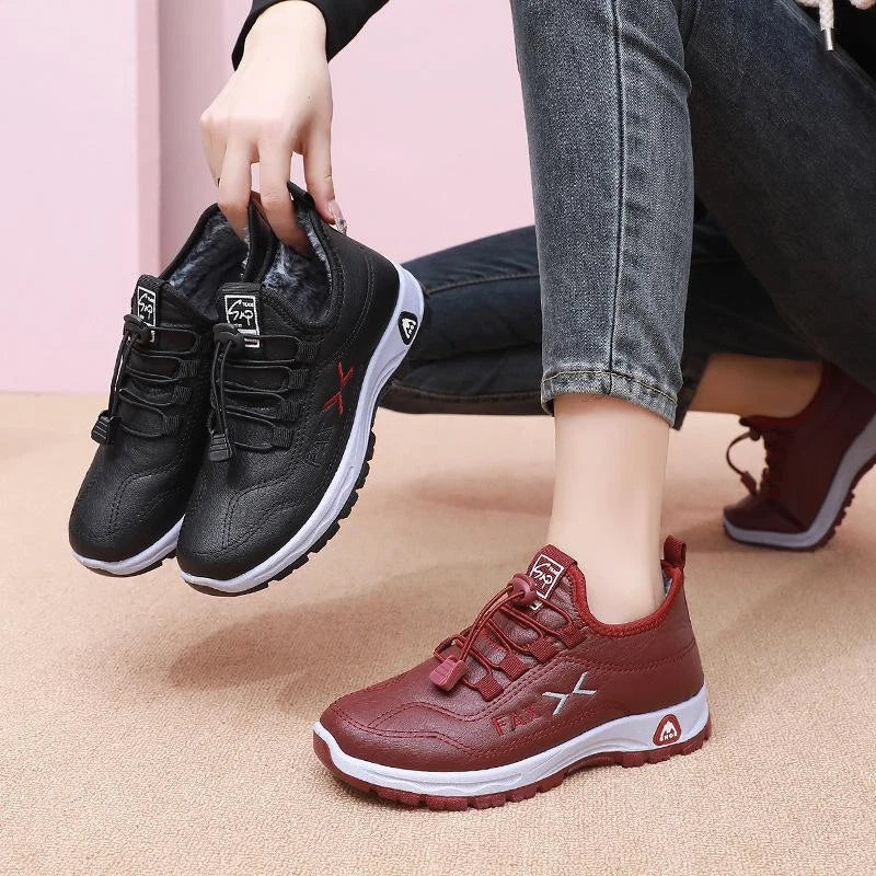 Vattentäta sneakers med snörning och fleecefoder för dam